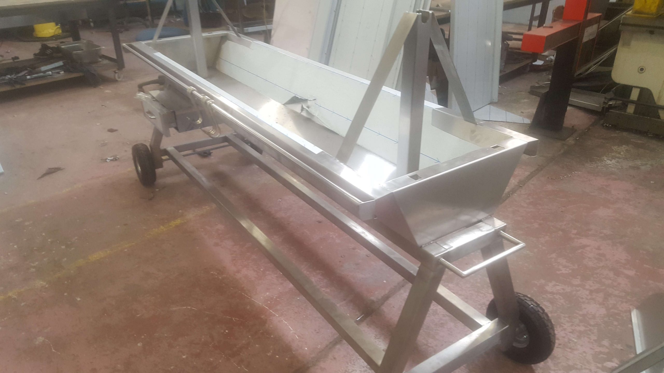 Stainless steel hog roast side view